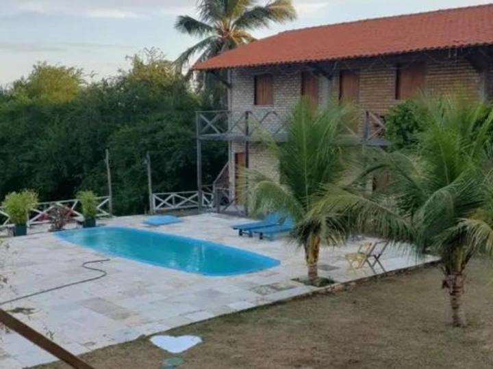 Bazén v ubytování Camping e Pousada Três Lagoas nebo v jeho okolí