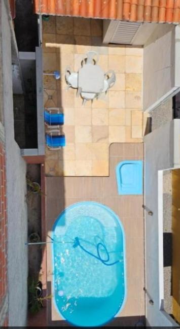 a painting on the side of a building at Sol & Vento Chalés - Chalé Tourinhos com piscina privativa in São Miguel do Gostoso