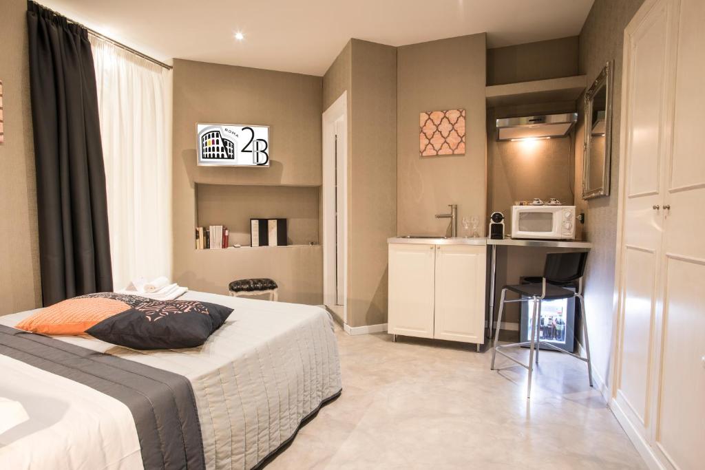 A bed or beds in a room at Roma 2B