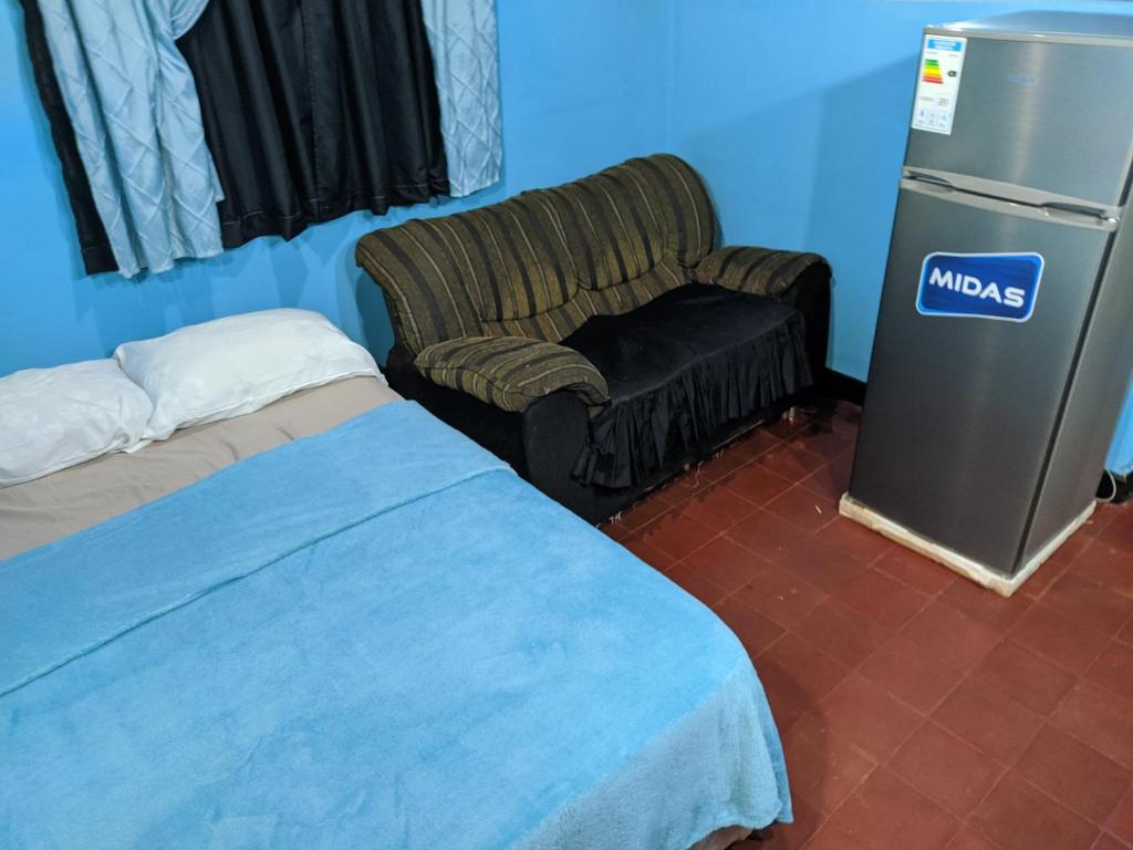 Ένα ή περισσότερα κρεβάτια σε δωμάτιο στο Casa independiente Mundial de rally