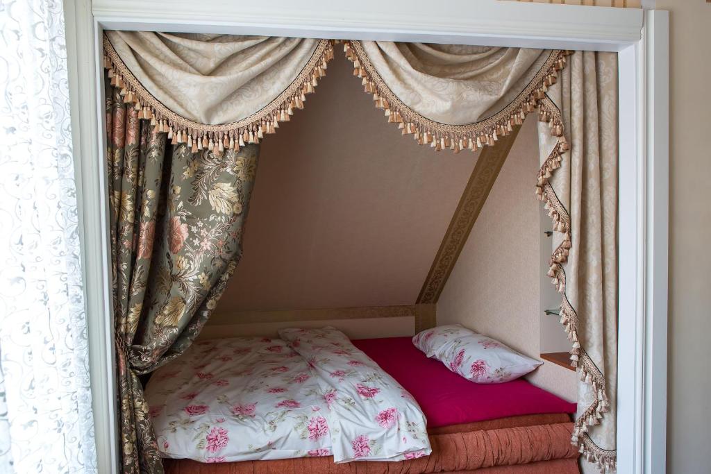 Postel nebo postele na pokoji v ubytování Videviku Villa Apartments
