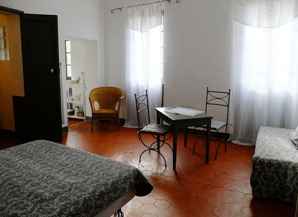 Postel nebo postele na pokoji v ubytování Le Bargidou