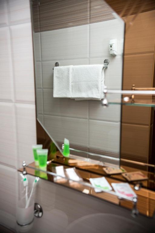 Koupelna v ubytování Capital Hotel