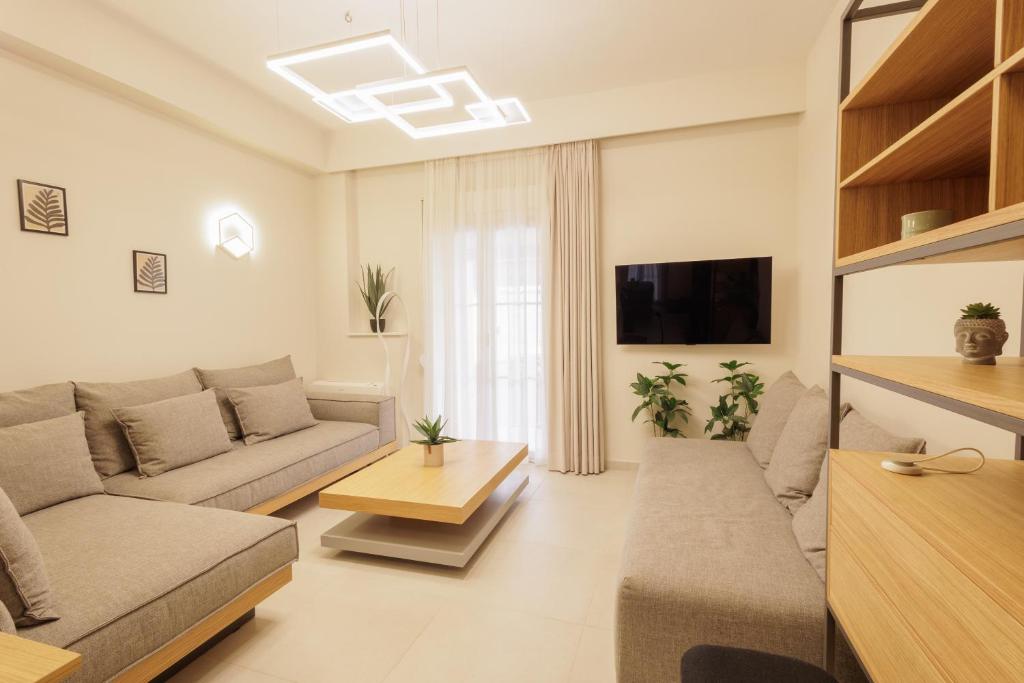 TV a/nebo společenská místnost v ubytování PANORAMIC VIEW CORFU TOWN CENTER