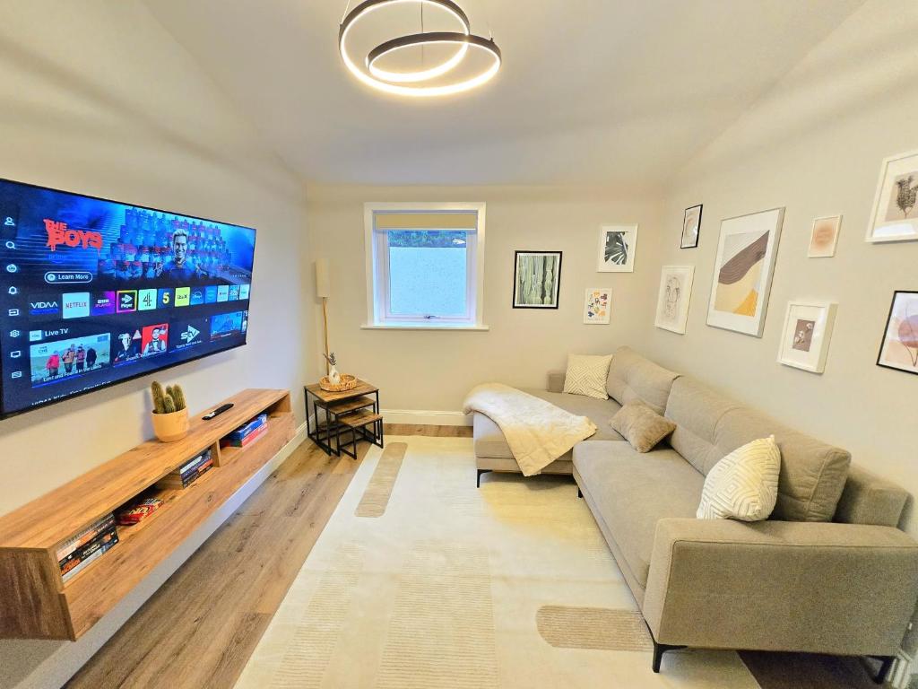 TV a/nebo společenská místnost v ubytování 3-Bed Home in Glasgow