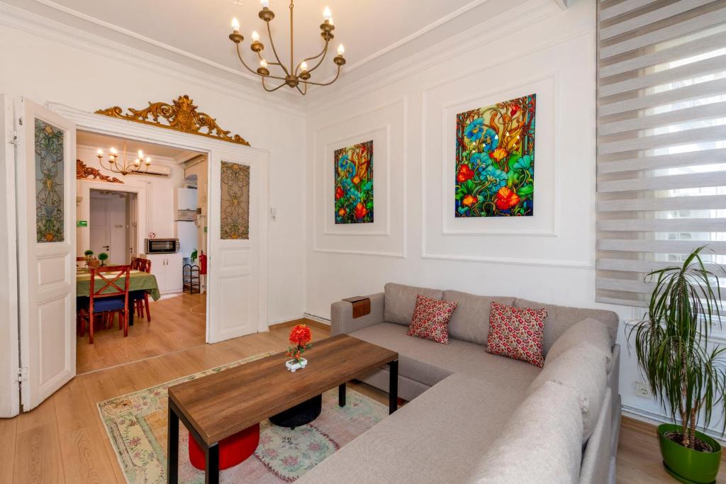 a living room with a couch and a table at The Heaven on Heritage Street in Istanbul