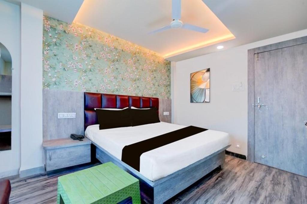 Postel nebo postele na pokoji v ubytování Hotel Alpine