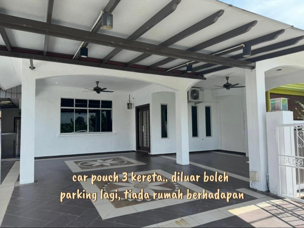 a view of a house with awning at D'Widuri Homestay Bandar Melaka in Melaka