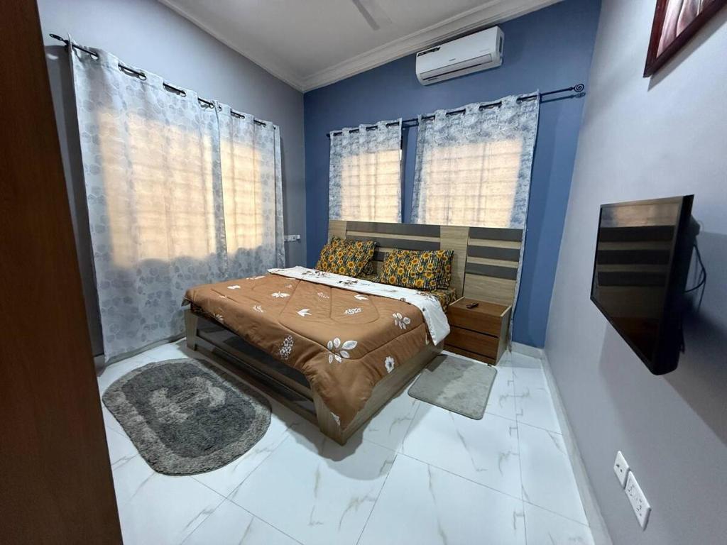 Ένα ή περισσότερα κρεβάτια σε δωμάτιο στο Jayda Lodge