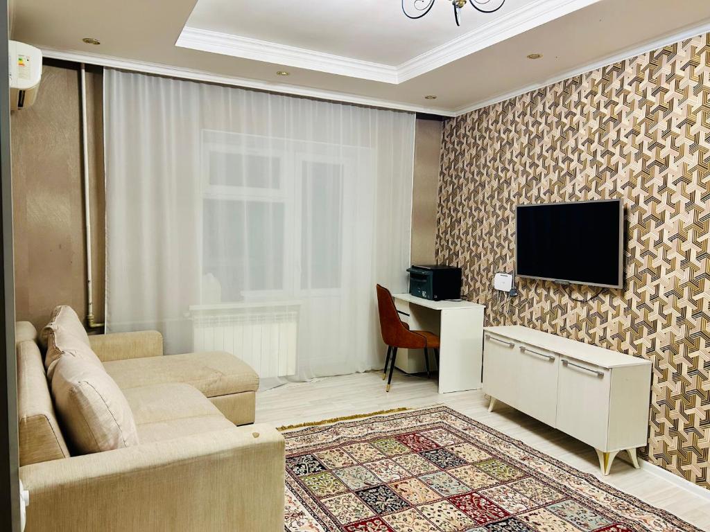 Televisyen dan/atau pusat hiburan di Apartmenti Kaldayakova