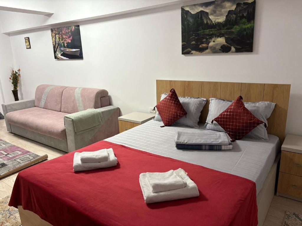 En eller flere senge i et værelse på Studio Lavinia