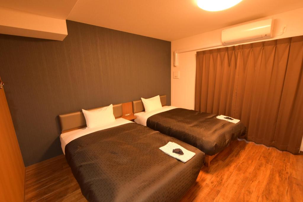 Postel nebo postele na pokoji v ubytování Hotel Trad