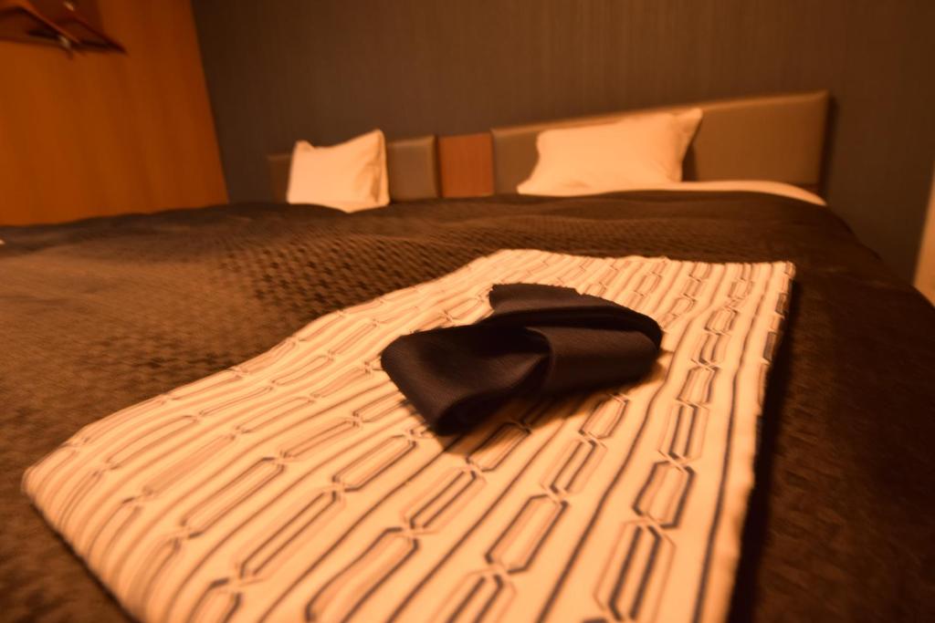 Postel nebo postele na pokoji v ubytování Hotel Trad