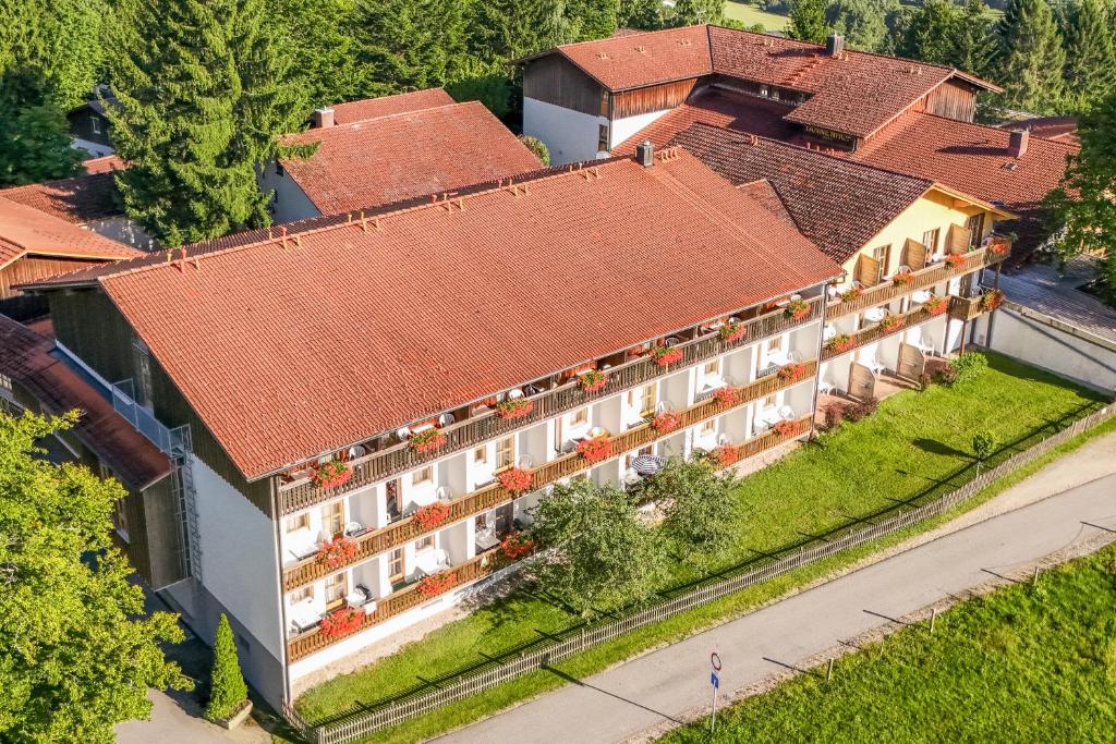 an overhead view of a large building with red roofs at Landhotel Tannenhof in Spiegelau