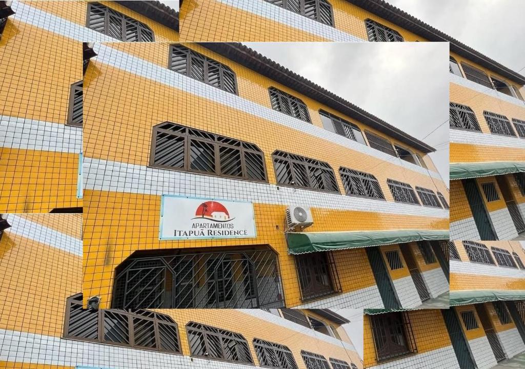 サルバドールにあるFlat na Praia em Salvador Térreoの黄色の建物