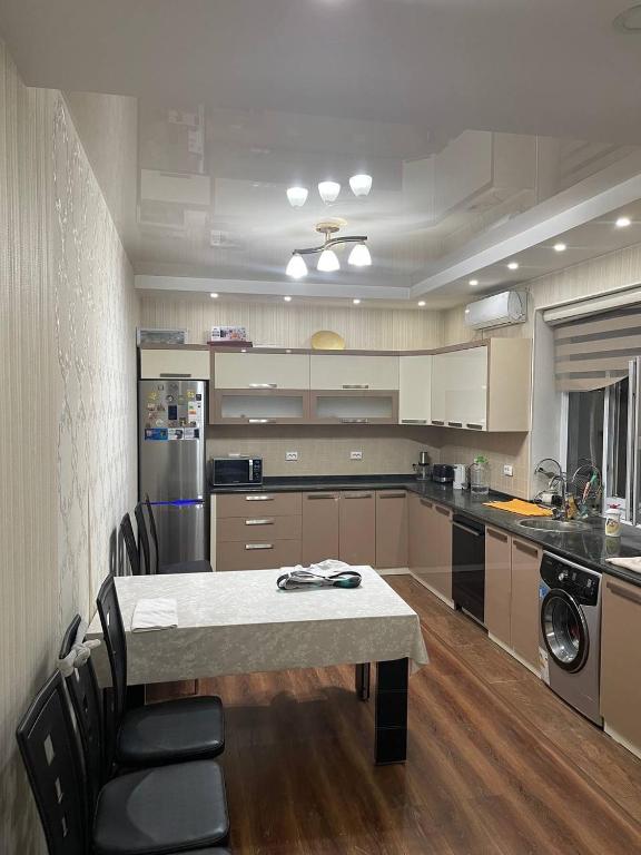 Virtuvė arba virtuvėlė apgyvendinimo įstaigoje Apartment