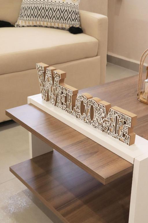 a coffee table in a living room with a couch at Stv Royal Appartments in Areopoli