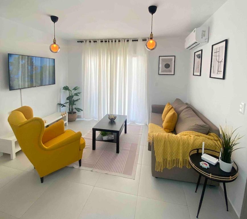 Ruang duduk di Family apartment in Punta Cana