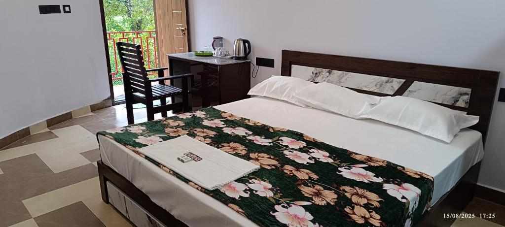 Postel nebo postele na pokoji v ubytování Light House Resort Peermedu