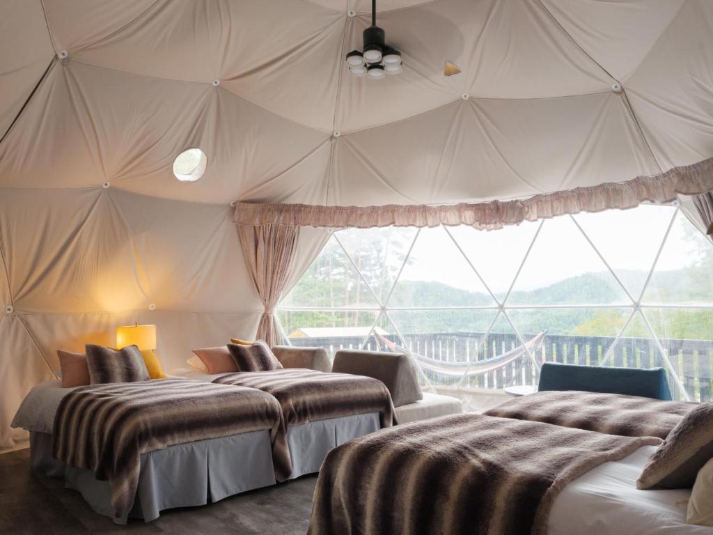 Katil atau katil-katil dalam bilik di TOCORO. Mt.Fuji CAMP & GLAMPING - Vacation STAY 23390v