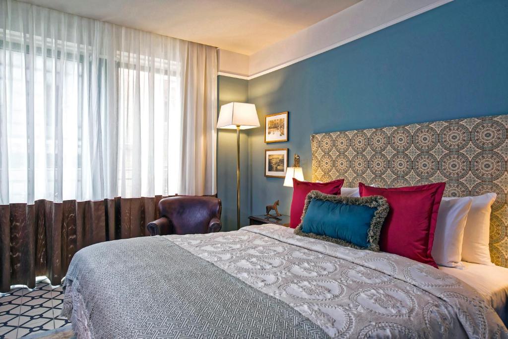 Postel nebo postele na pokoji v ubytování Arthur Hotel - an Atlas Boutique Hotel