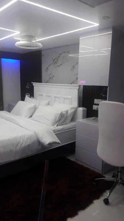 Ένα ή περισσότερα κρεβάτια σε δωμάτιο στο Chinedu Apartment