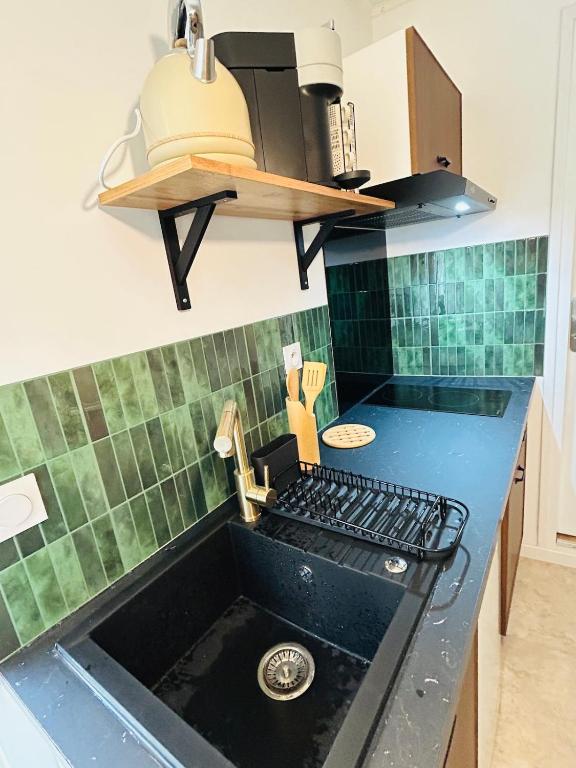 Dapur atau dapur kecil di Magnifique Petit Marnais Parking gratuit-linge inclus