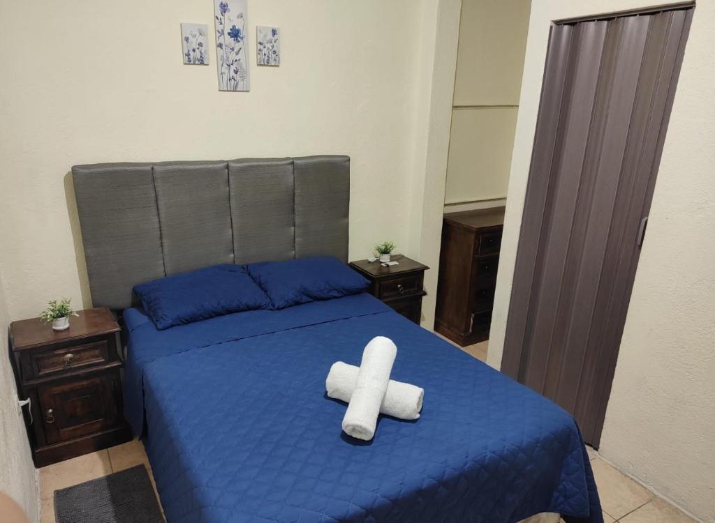 Ένα ή περισσότερα κρεβάτια σε δωμάτιο στο Casa Valle de Panchoy II