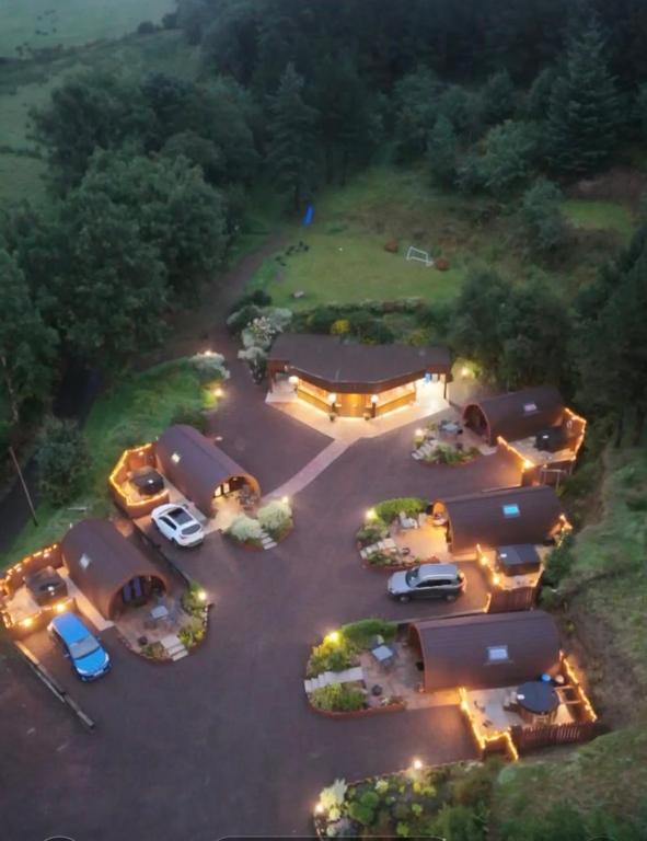 an aerial view of a parking lot at night at Gortin Glen Glamping in Omagh