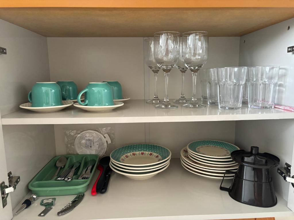 Kuchyň nebo kuchyňský kout v ubytování Apto Conquista espaçoso e confortável