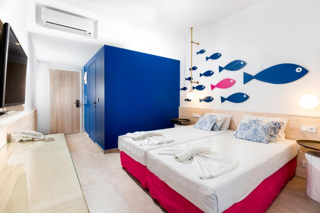 Postel nebo postele na pokoji v ubytování Orion Hotel