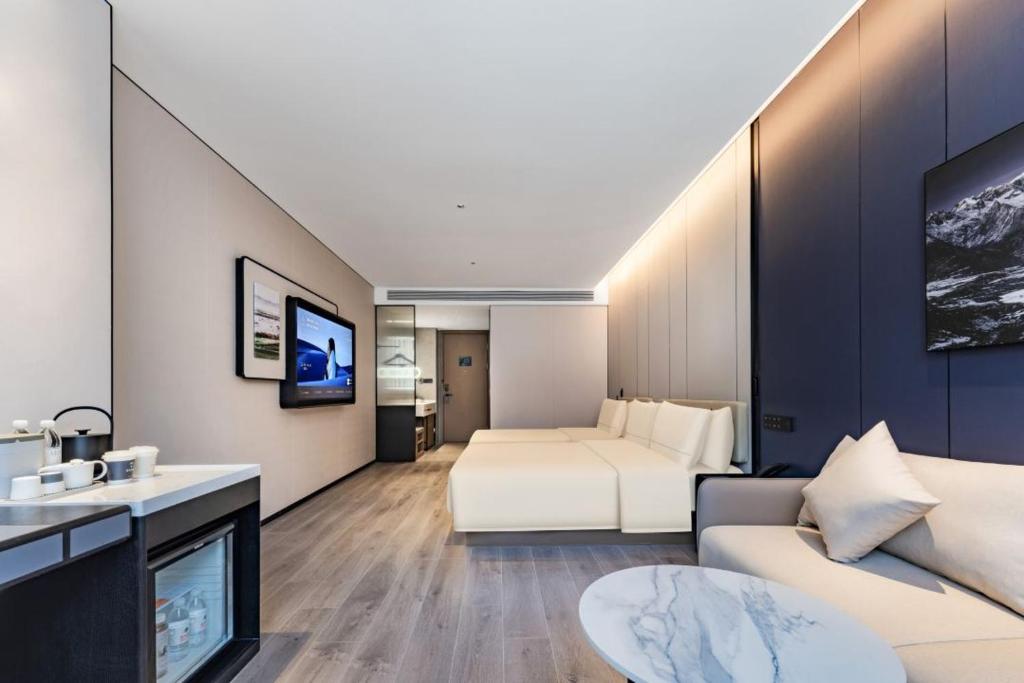 Χώρος καθιστικού στο Atour Hotel Jiuquan Drum Tower