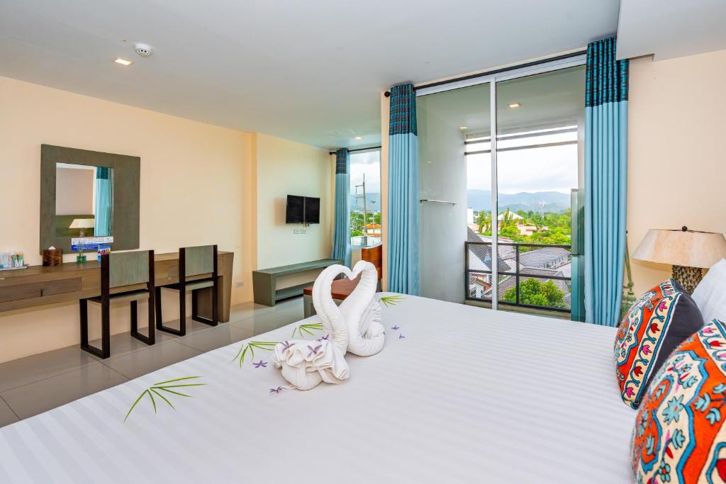 The Cheetar Hotel, Phuket - Habitación Doble Deluxe (2 Adultos + 1 Niño)