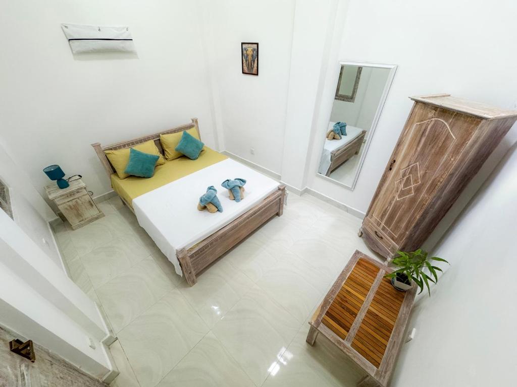 Ένα ή περισσότερα κρεβάτια σε δωμάτιο στο Villa Seshé - Central Stay Kandy