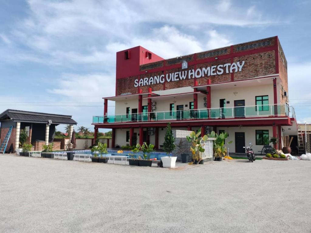 Bangunan di mana terletaknya rumah tamu ini