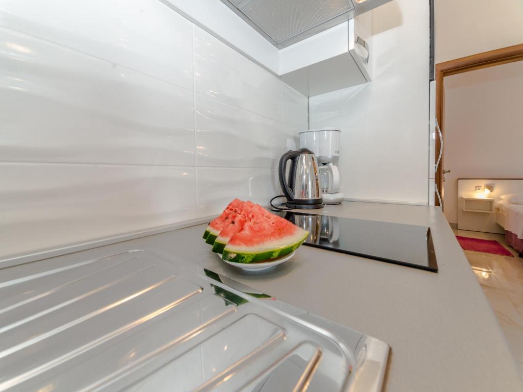 Kuchyň nebo kuchyňský kout v ubytování Apartments Dalmatia