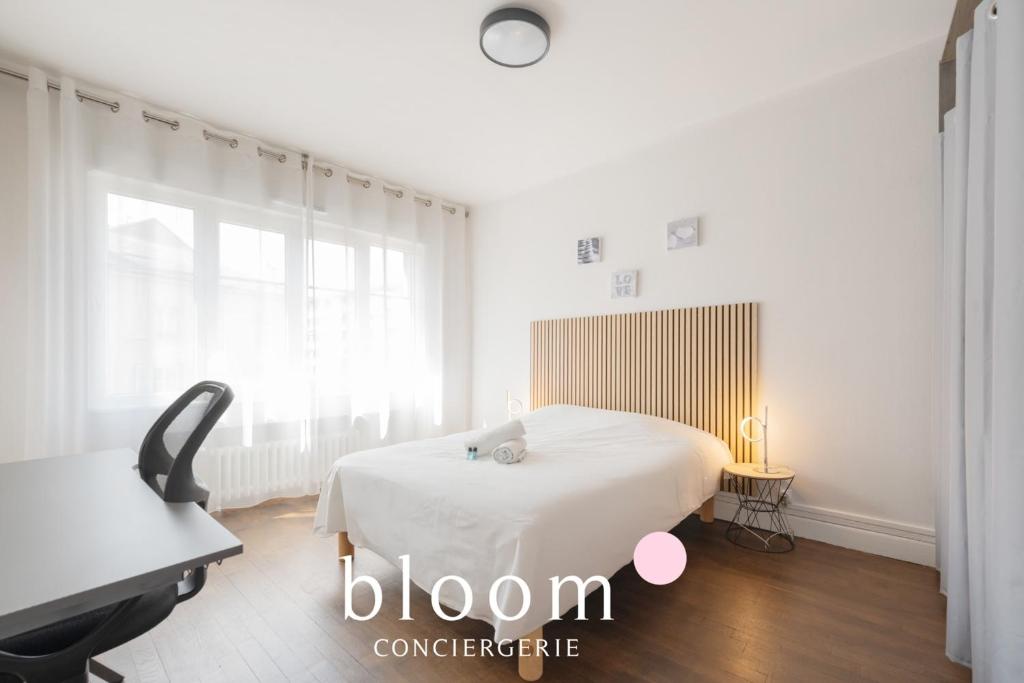 Ένα ή περισσότερα κρεβάτια σε δωμάτιο στο Nancy Plein Centre 6 Voyageurs