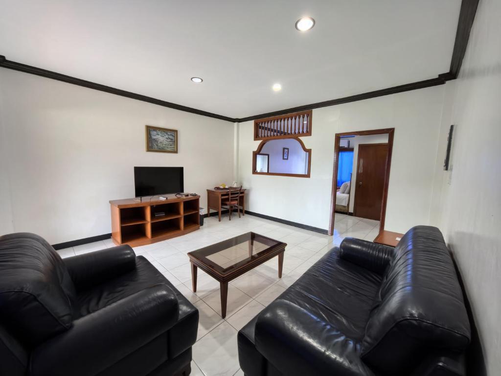 Μια τηλεόραση ή/και κέντρο ψυχαγωγίας στο S&C Hotel Suites and Apartments