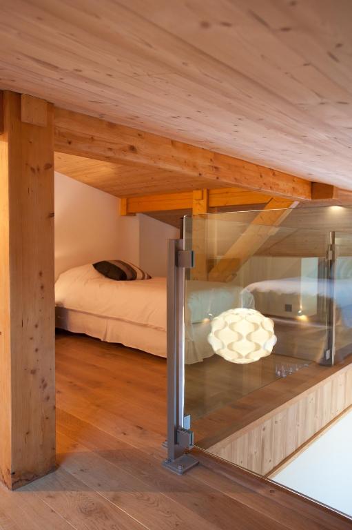 Postel nebo postele na pokoji v ubytování Quartz-Montblanc