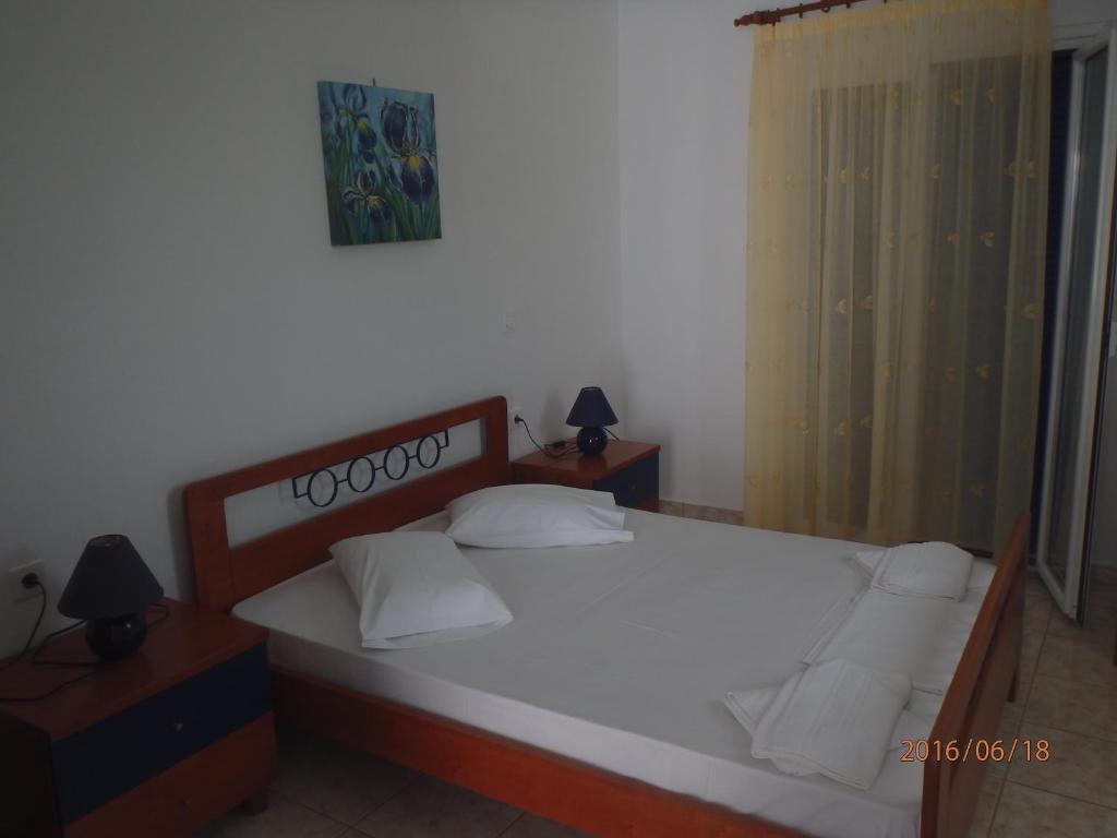 Postel nebo postele na pokoji v ubytování Mylos