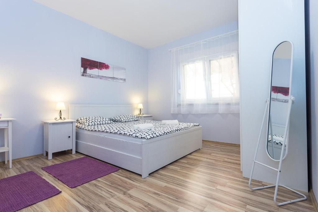 Posteľ alebo postele v izbe v ubytovaní Apartment Perunika