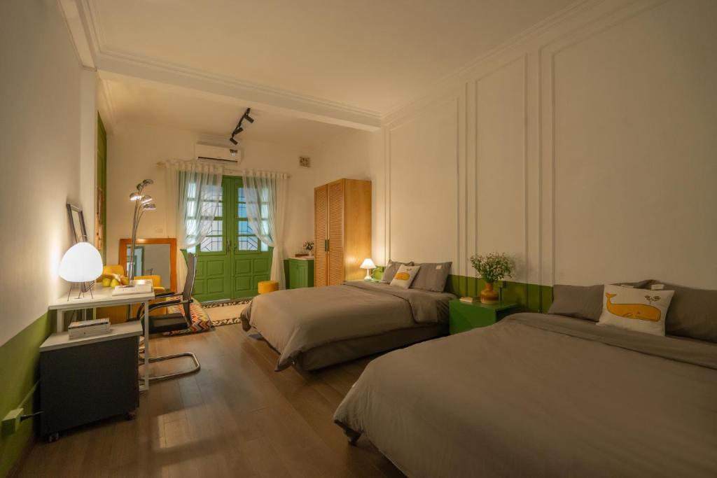 Postel nebo postele na pokoji v ubytování La paix homestay