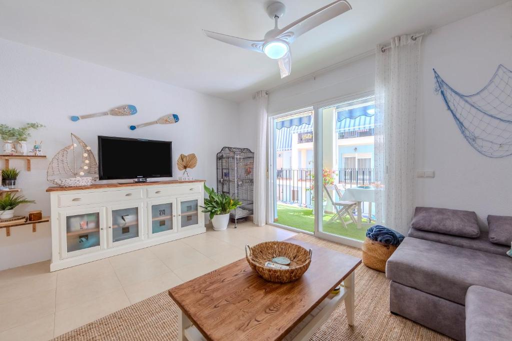 Μια τηλεόραση ή/και κέντρο ψυχαγωγίας στο Apartamento Zen Dreams Almerimar