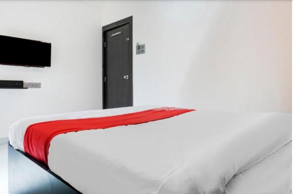 Postel nebo postele na pokoji v ubytování Hotel RajYog