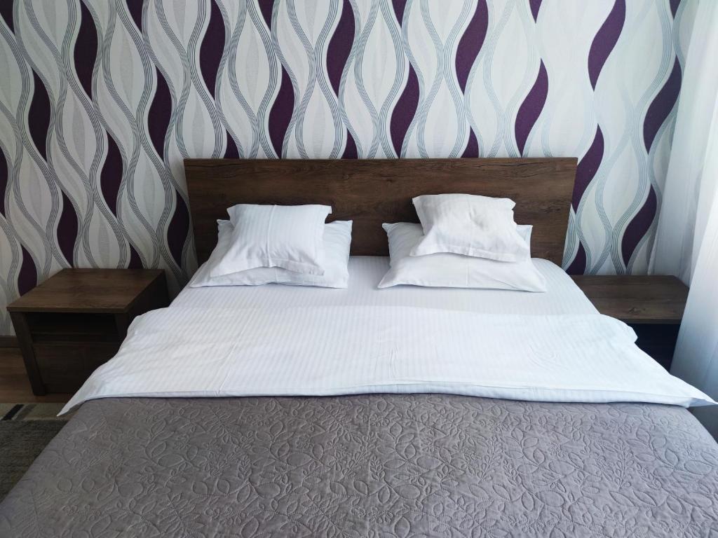 Ένα ή περισσότερα κρεβάτια σε δωμάτιο στο Apartament Victoria