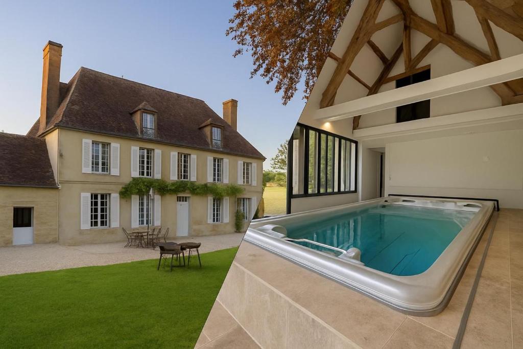 a swimming pool in the backyard of a house at Le Presbytère - demeure d'exception historique in Biéville-en-Auge