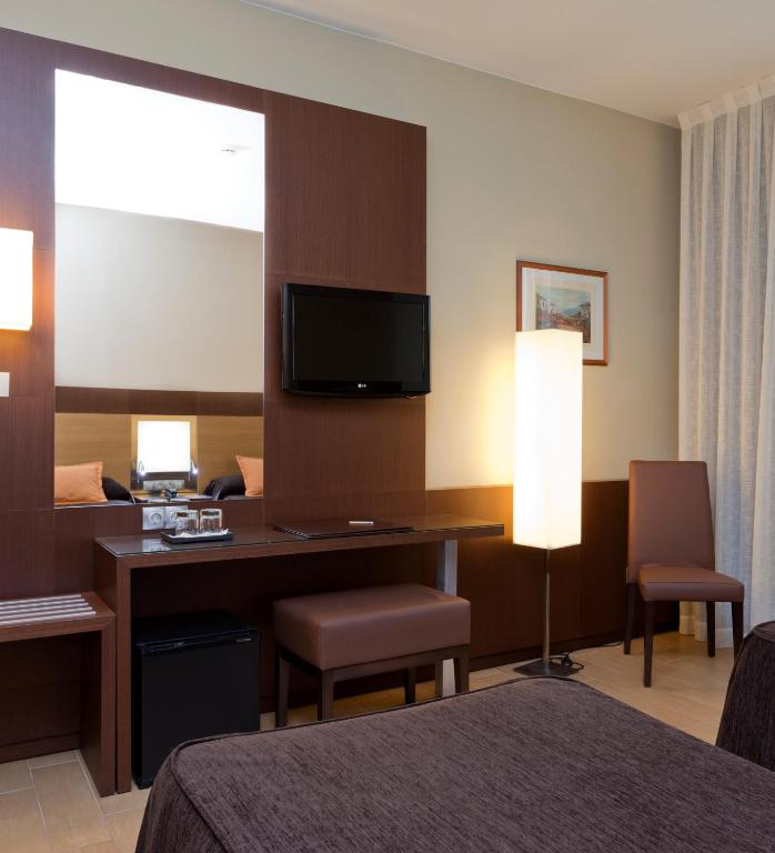 TV a/nebo společenská místnost v ubytování Hotel Ciudad de Alcañiz
