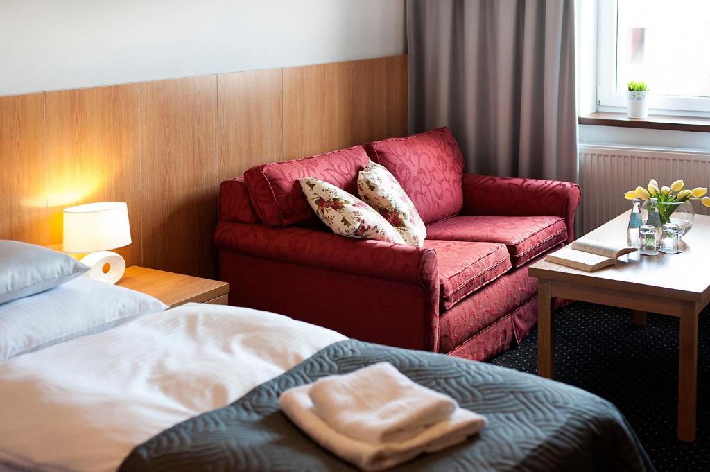Posteľ alebo postele v izbe v ubytovaní Apartamenty Turek