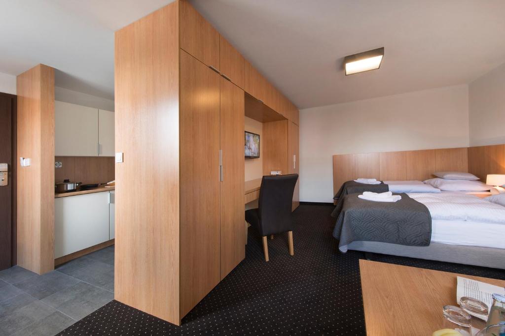 Posteľ alebo postele v izbe v ubytovaní Apartamenty Turek