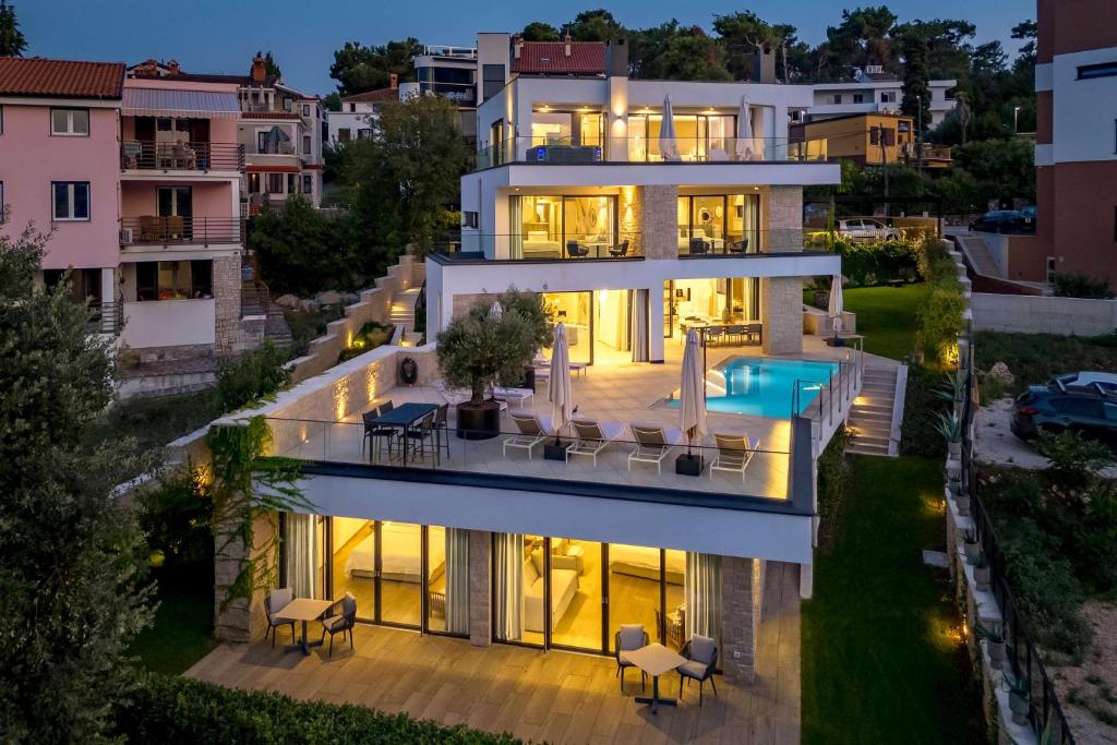 an aerial view of a house with a pool at Villa Albion in Rovinj